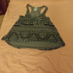A gray tank with a black design
